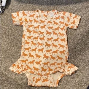 Kate Quinn ruffle onesie